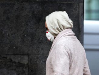 Mann mit Maske, über dts Nachrichtenagentur